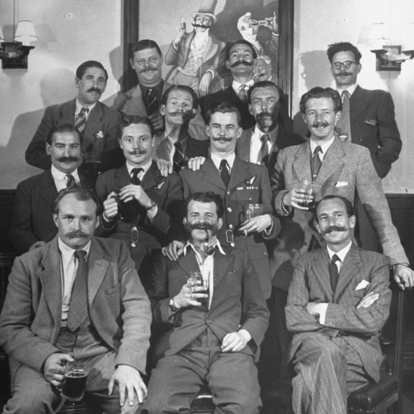 The Handlebar Club enjoys a drink.  1947.