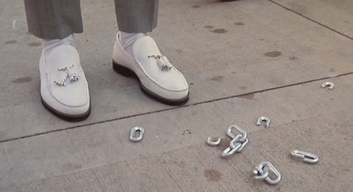 Pee-Wee: cropped trousers and white tassels