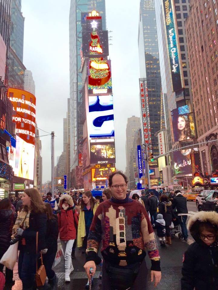 This guy makes sweaters of things and then takes pictures of himself